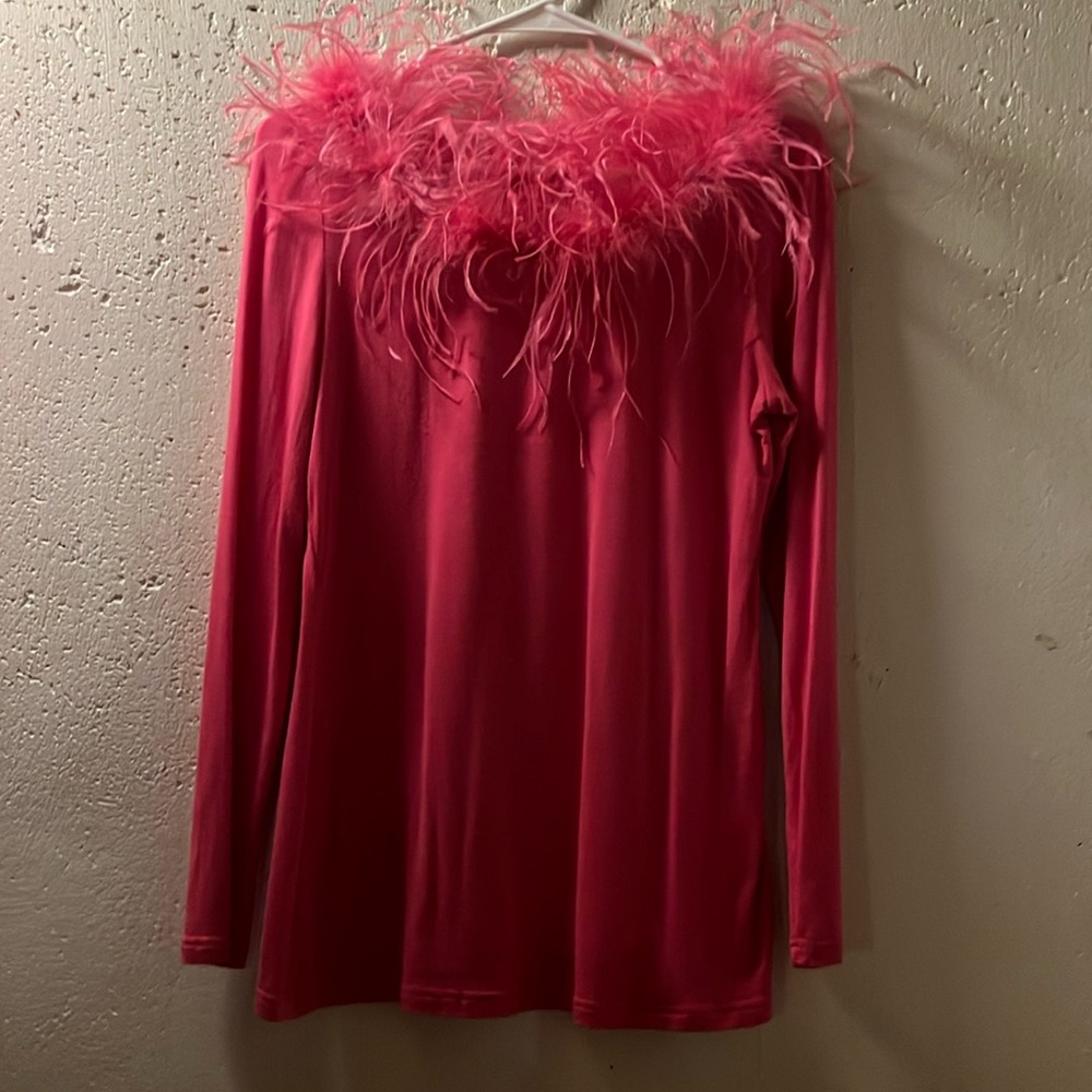 Girly hot pink long sleeve shirt by brand Berek. Maribou feathers at collar. M.